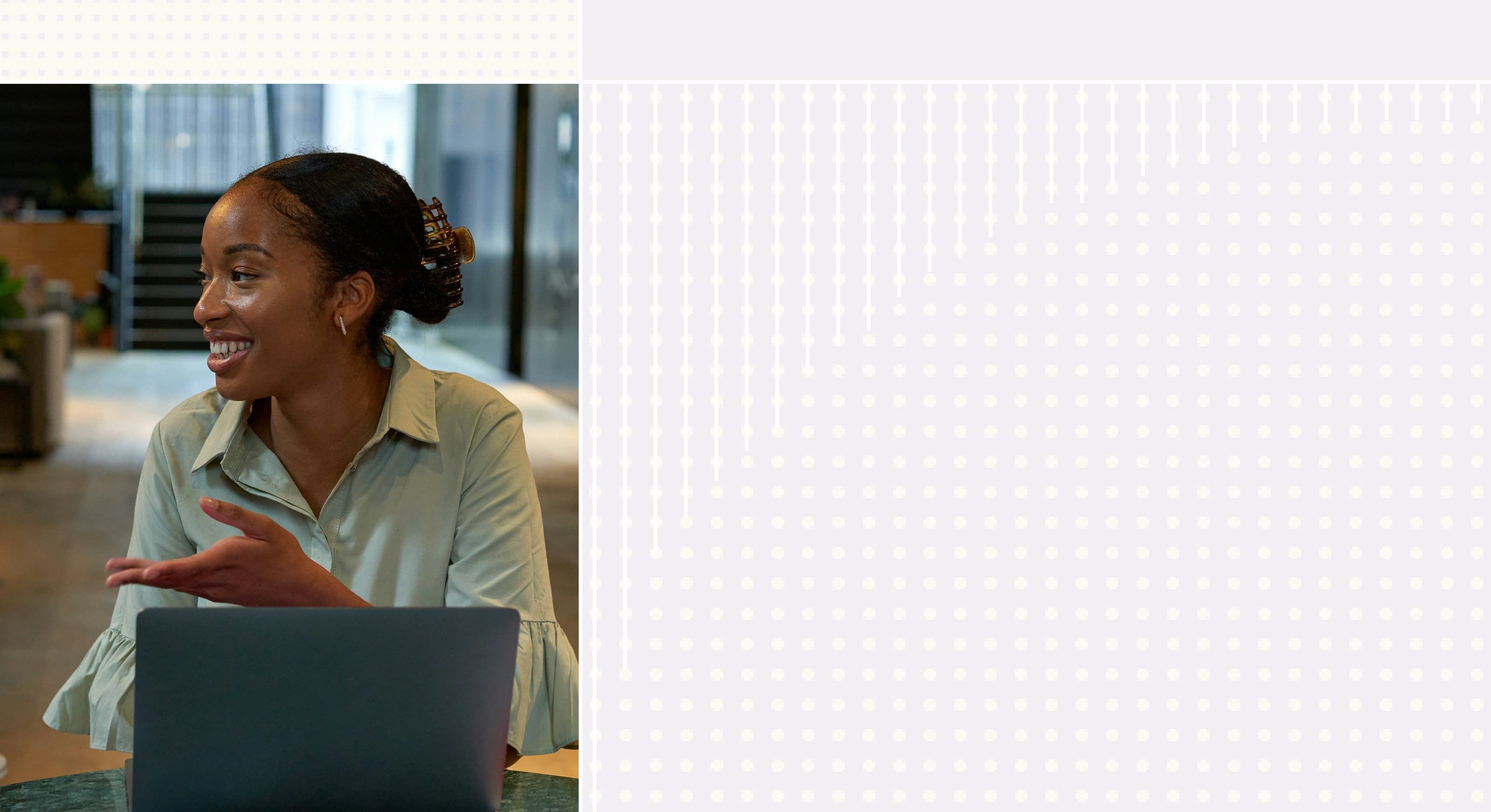 Image of a female marketer working at a laptop at a tech company